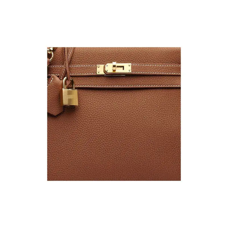 Hermès Kelly 25 brown Togo leather handbag featuring gold hardware, a luxurious fashion bag ideal for everyday use.