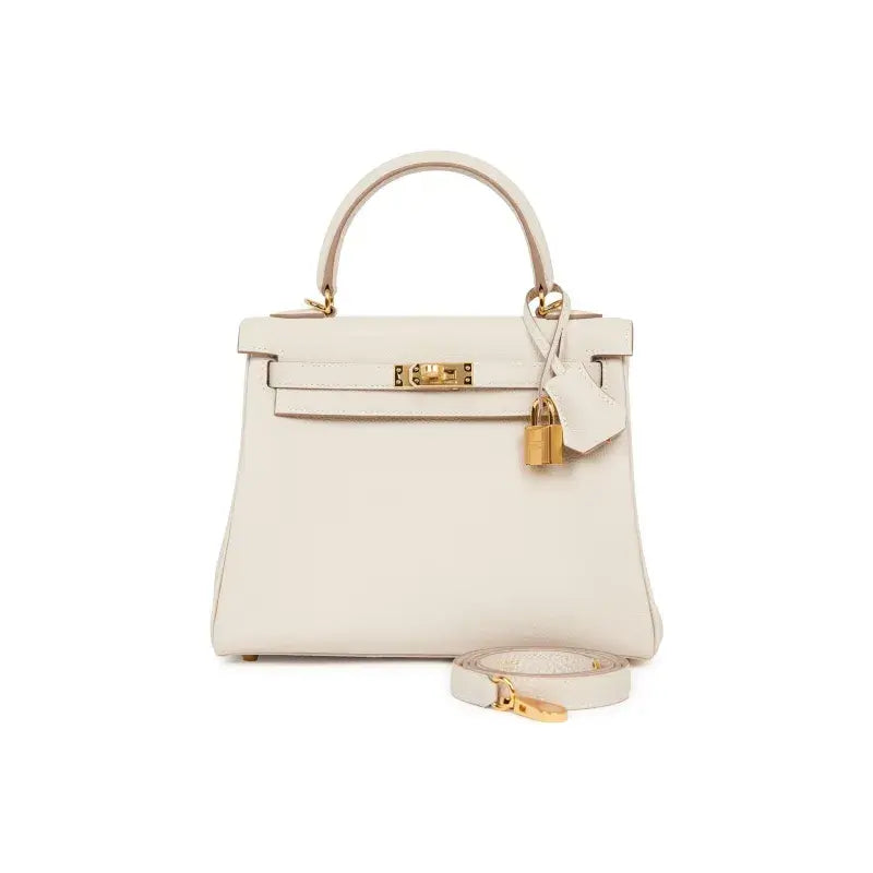 HERMES Kelly 25 cream Togo leather handbag with gold accents, a luxury bag for women, ideal for stylish everyday use.