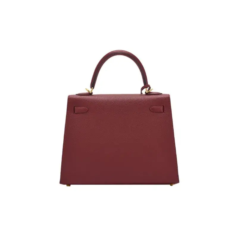 Hermès Kelly red Togo leather handbag with gold hardware, a timeless luxury bag for women