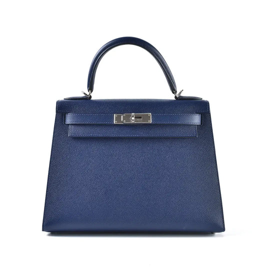 Hermès Kelly Bag in navy Epsom leather with silver hardware, a timeless luxury bag for women and a stylish everyday bag.