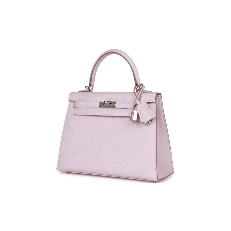HERMES Kelly Bag in mauve pale dream purple leather, a luxury bag for women with silver hardware, perfect for elegant occasions.