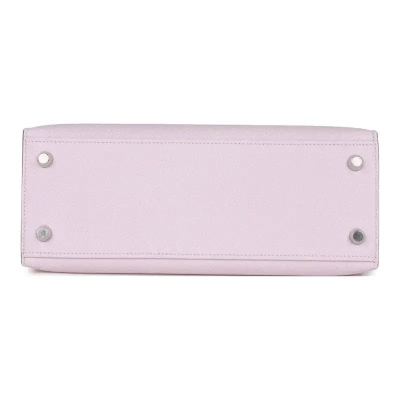 HERMES Kelly Bag Epsom leather handbag in mauve pale dream purple showing the bottom view with silver hardware, a timeless luxury bag for women.