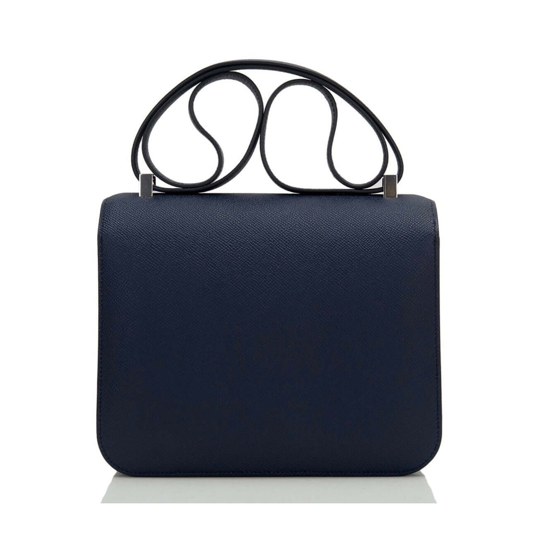 Hermès Constance Mini 18 luxury bag for women in navy color with elegant top handle design, high quality fashion accessory.