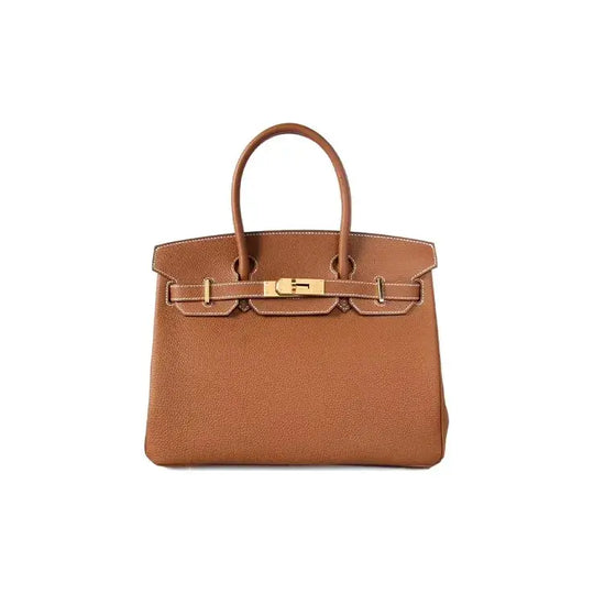 HERMES Birkin 25 brown togo leather handbag with gold hardware, a luxurious everyday bag for women, showcasing timeless style.