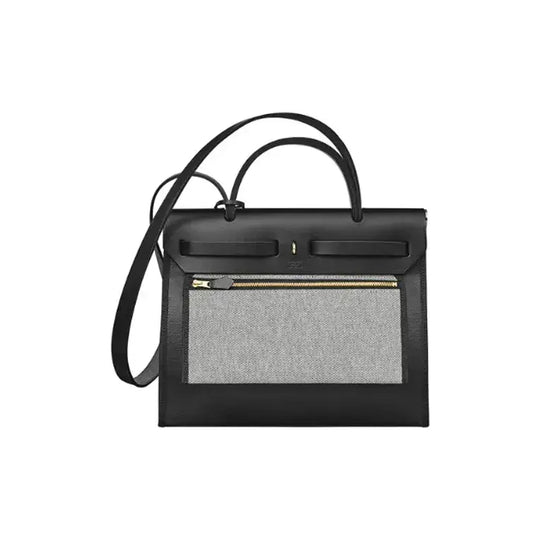 Hermes Herbag 31 black luxury handbag with canvas and leather, a stylish and functional everyday bag for women.