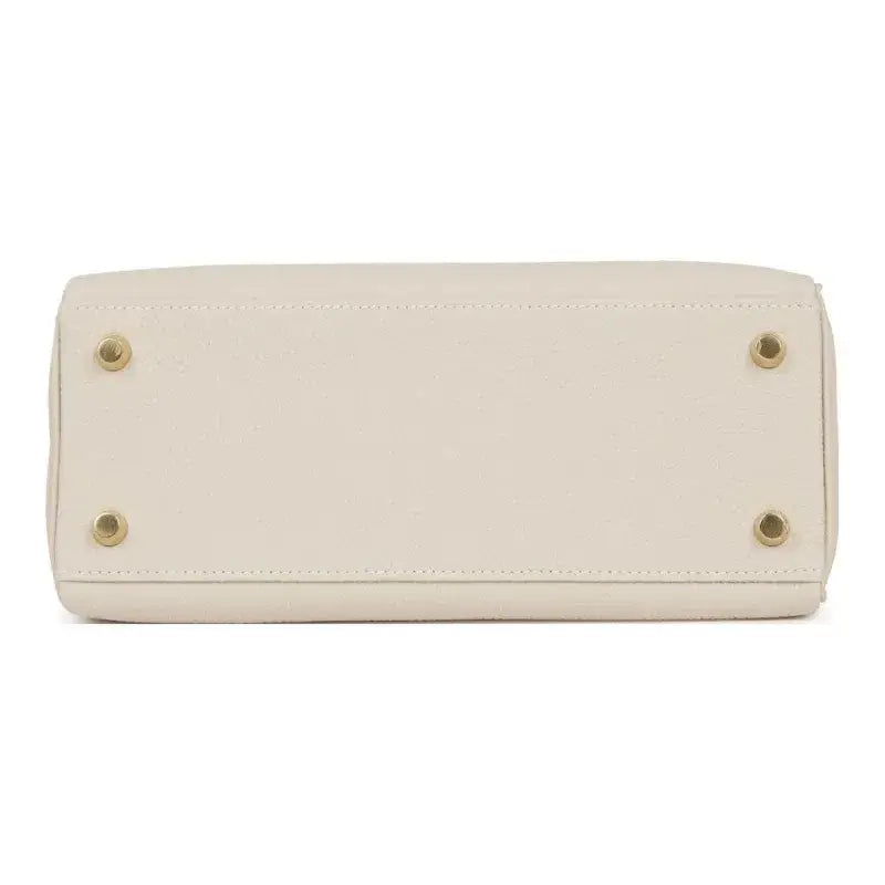 HERMES Kelly 25 cream Togo leather handbag bottom view showcasing high quality and elegant design, perfect luxury bag for women.