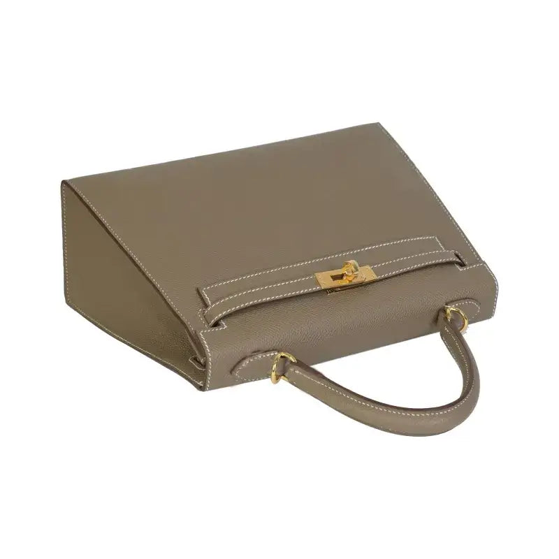 HERMES Kelly Bag in elephant gray Epsom leather with gold hardware, a stylish designer handbag perfect for elegant everyday use.