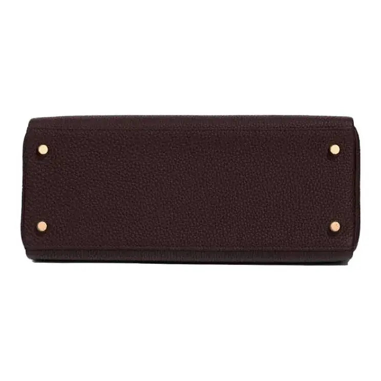 Hermès Kelly 25 Saddle Red Togo leather handbag in brown with gold hardware, a stylish and elegant designer handbag for women.