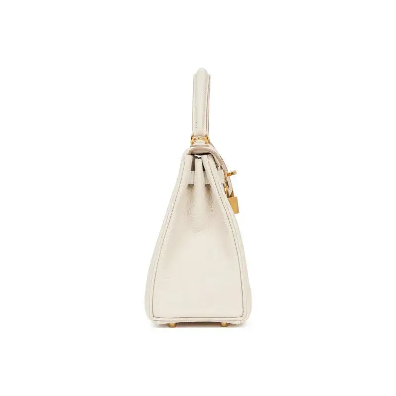 HERMES Kelly 25 cream Togo leather bag showing side view, a luxury bag for women with elegant design and high quality craftsmanship