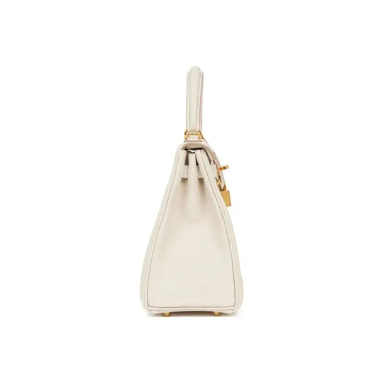HERMES Kelly 25 cream Togo leather bag showing side view, a luxury bag for women with elegant design and high quality craftsmanship