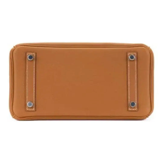HERMES Birkin 25 brown togo leather handbag base with silver hardware, showcasing craftsmanship for a luxury bag for women.