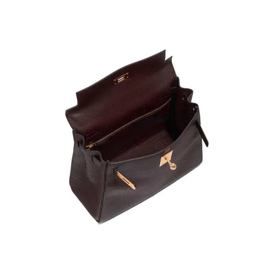 interior view of a luxury bag for women in dark brown leather, featuring spacious compartments and stylish design, ideal everyday bag
