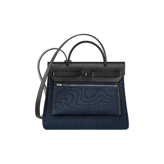 Hermes Herbag 31 navy blue luxury bag for women featuring elegant design and high-quality materials.