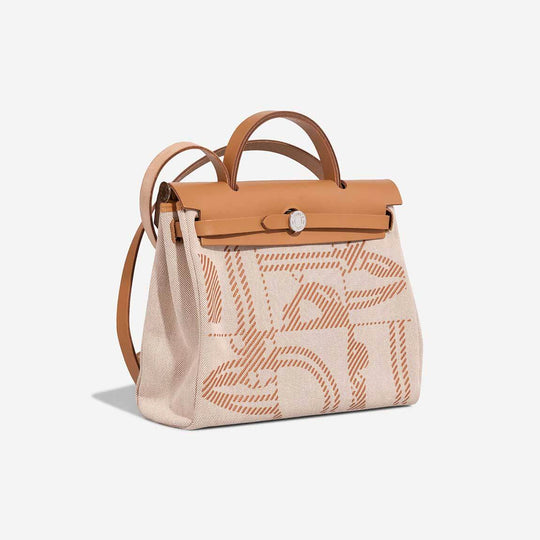 Hermès Herbag 31 luxury bag for women in beige and brown, high-quality canvas and calfskin leather, stylish everyday bag.
