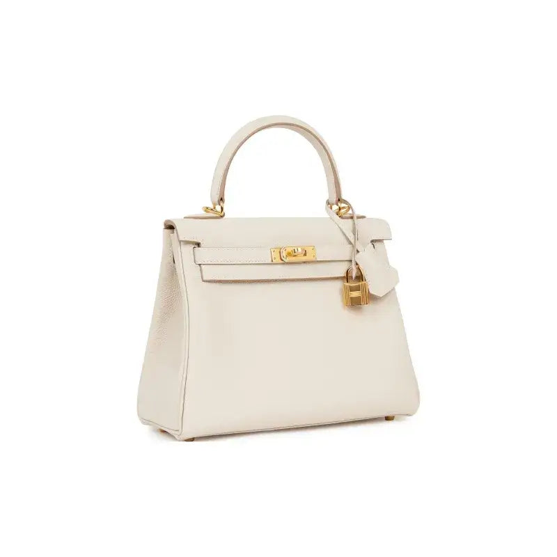 HERMES Kelly 25 cream Togo leather handbag featuring elegant design and high-quality craftsmanship, ideal luxury bag for women.