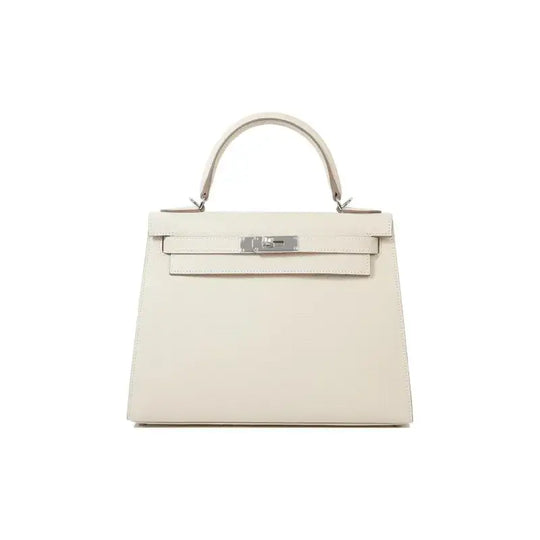 HERMES Kelly 25 luxury bag for women in milkshake white color with silver hardware, a timeless designer handbag.