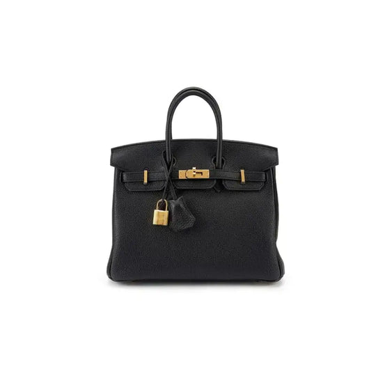 Hermes Birkin Bag in black togo leather with gold hardware, a luxury bag for women symbolizing timeless elegance.