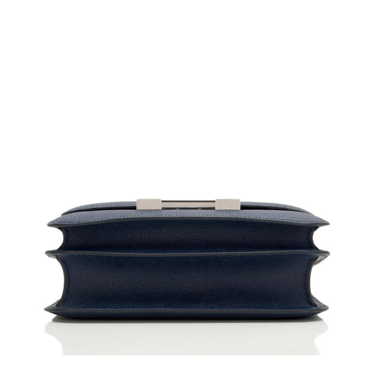 Hermès Constance Mini 18 navy leather handbag with silver-tone clasp, elegant style, luxury bag for women.