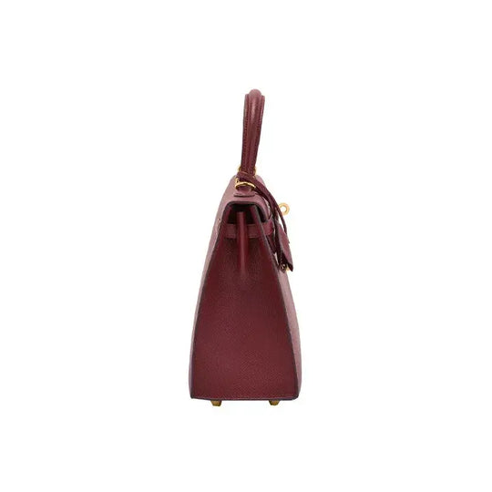 Hermes Kelly red Togo leather handbag showcasing elegant design, gold hardware, and high quality craftsmanship, a luxury bag for women.