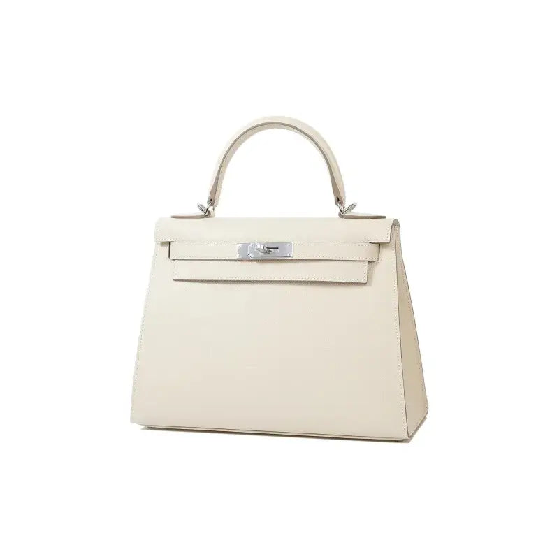 HERMES Kelly 25 Bag in Milkshake White Epsom Leather with silver hardware, a luxury bag for women showcasing timeless elegance.