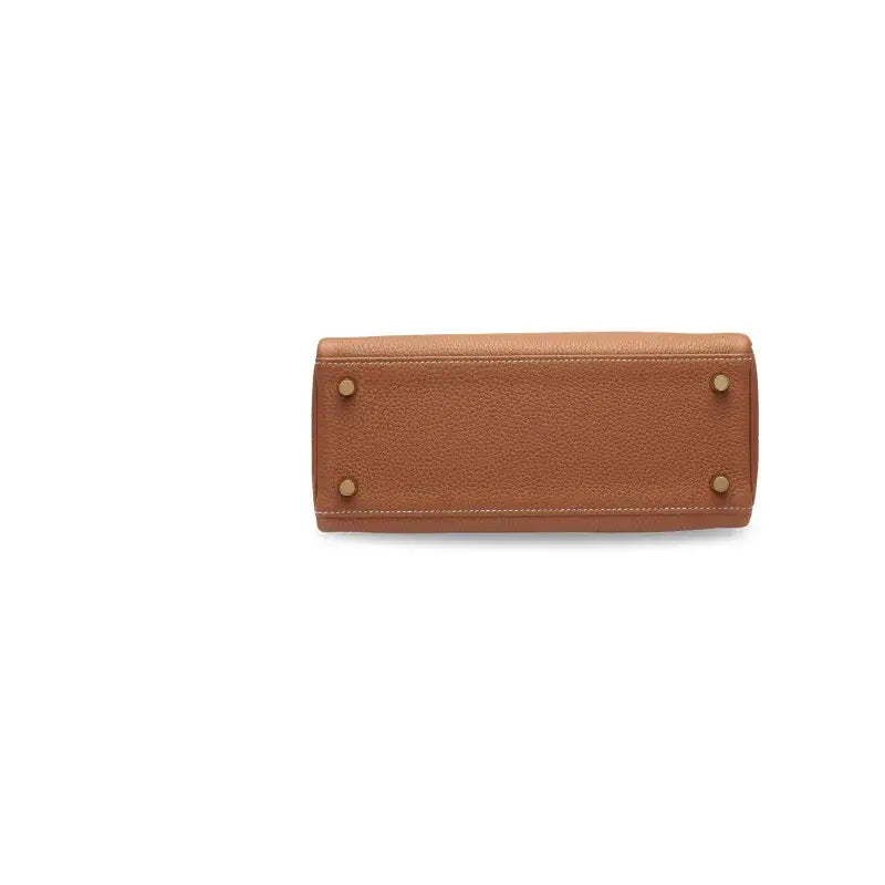 Hermès Kelly 25 brown Togo leather handbag base, a luxury bag for women showcasing high-quality craftsmanship and timeless elegance.