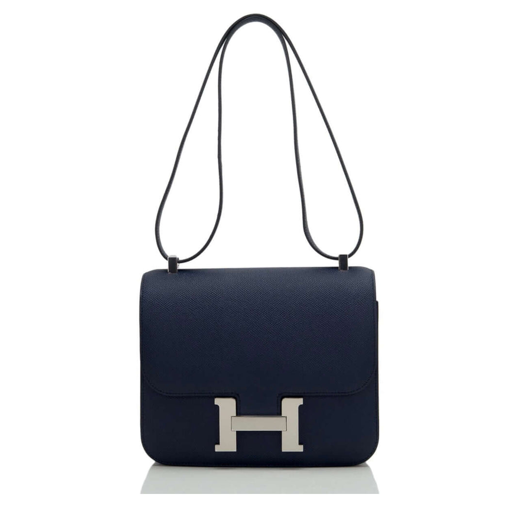 Hermès Constance Mini 18 luxury bag for women in navy leather with silver-tone H clasp, an elegant designer handbag for every occasion