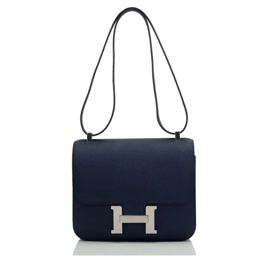 Hermès Constance Mini 18 luxury bag for women in navy leather with silver-tone H clasp, an elegant designer handbag for every occasion