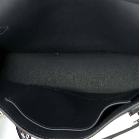 Interior view of a luxurious Hermès Jypsière handbag showcasing high-quality black leather, ideal for everyday use.