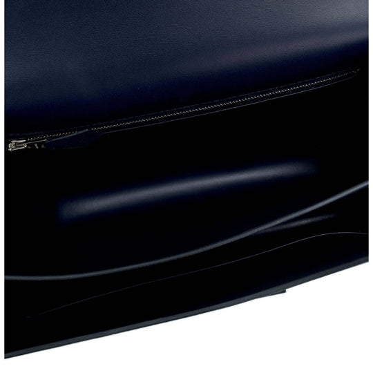 interior view of Hermès Constance Mini 18 luxury bag showcasing sleek black leather and zip pocket for organized storage