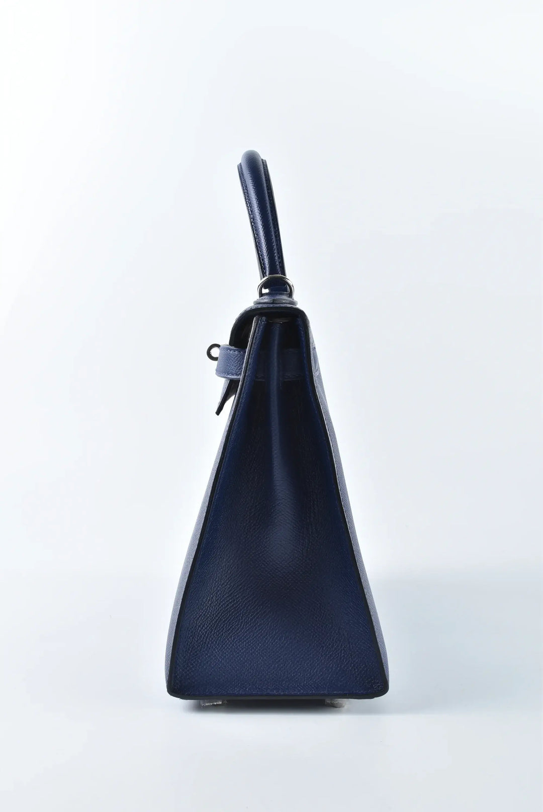 Hermès Kelly Bag Epsom leather handbag in navy with silver hardware, a timeless luxury bag for women and elegant fashion accessory.