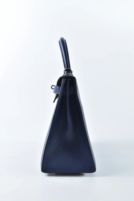Hermès Kelly Bag Epsom leather handbag in navy with silver hardware, a timeless luxury bag for women and elegant fashion accessory.