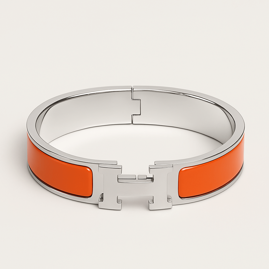 Hermes Clic HH bracelet 12MM in vibrant orange with shiny VGold H clasp, a high quality fashion accessory for stylish outfits.