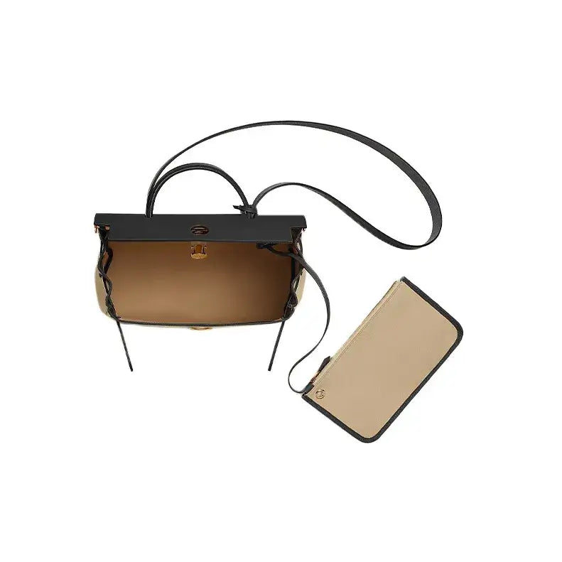 Hermes Herbag 31 luxury bag for women in black and beige, featuring a modern design and interchangeable canvas body, high quality fashion accessory