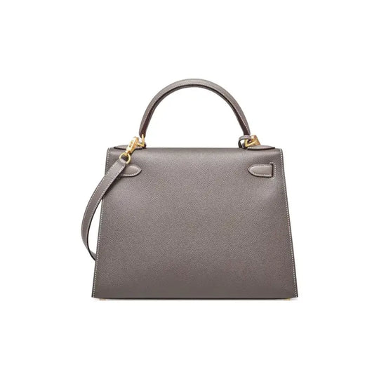 HERMES Kelly Bag in tin gray Epsom leather with gold hardware, a luxury bag for women and a timeless fashion statement.