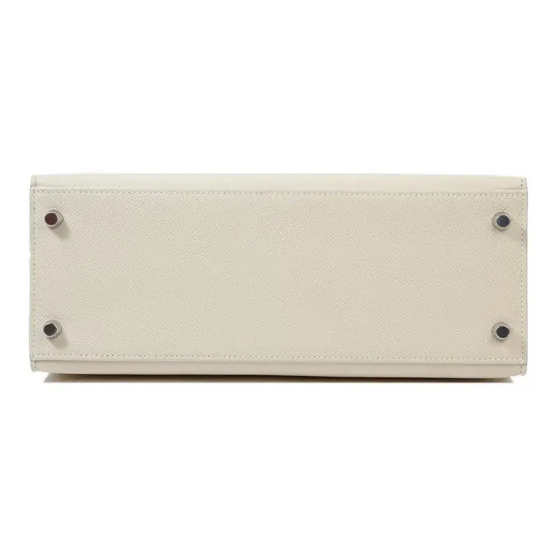 Hermes Kelly 25 bag Epsom leather handbag bottom view in milkshake white, high quality stylish handbag for women.
