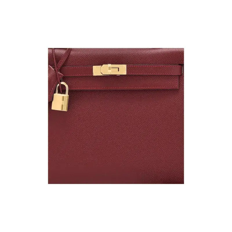 HERMES Kelly red Togo leather designer handbag with gold hardware, an elegant luxury bag for women.