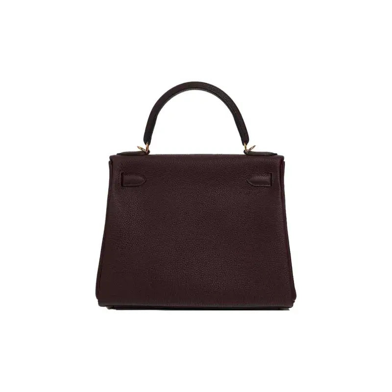 Hermès Kelly 25 luxury bag for women in saddle red Togo leather, classic design with silver hardware, perfect for everyday elegance.