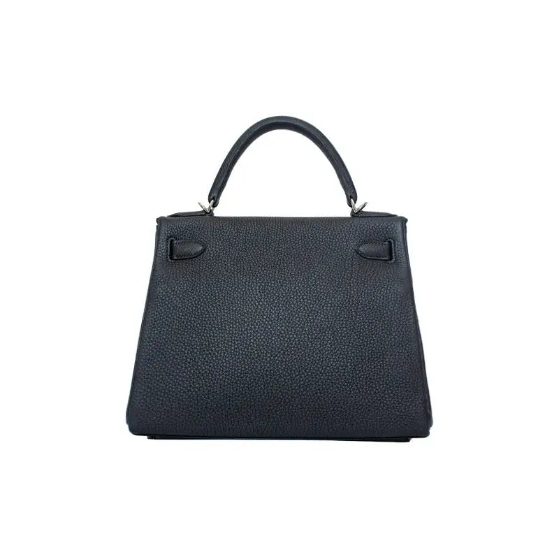 Hermès Kelly 25 navy blue Togo leather handbag featuring elegant design and high quality craftsmanship, a timeless luxury bag for women.