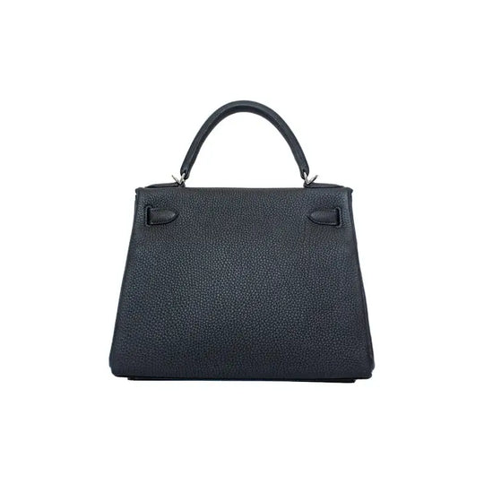 Hermès Kelly 25 navy blue Togo leather handbag featuring elegant design and high quality craftsmanship, a timeless luxury bag for women.