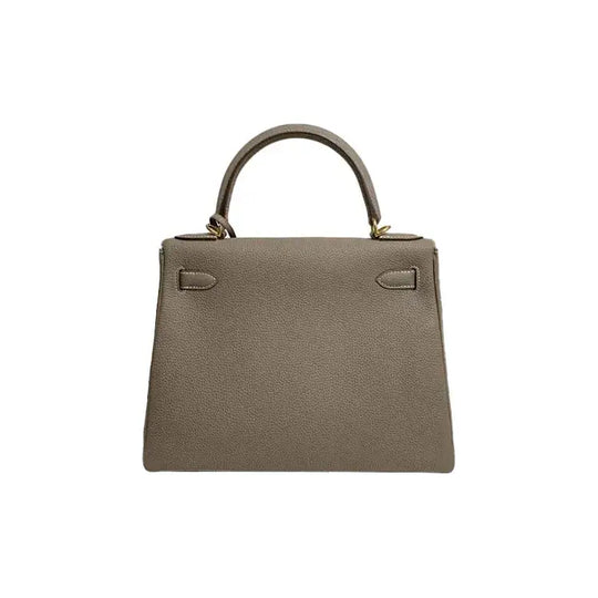 HERMES Kelly 25 elephant gray Togo leather handbag, a luxury bag for women, crafted with high quality for timeless elegance.