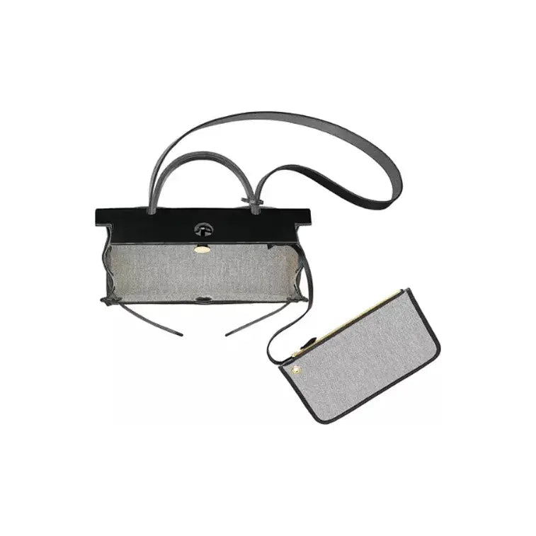 Hermes Herbag 31 black canvas and leather design with removable pouch, luxurious yet affordable fashion bag for women.