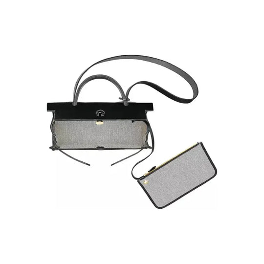 Hermes Herbag 31 black canvas and leather design with removable pouch, luxurious yet affordable fashion bag for women.