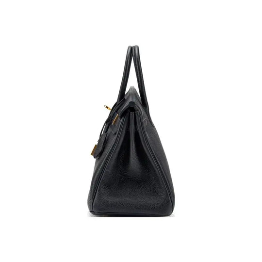Hermès Birkin Bag black togo leather handbag showcasing elegant profile and high quality craftsmanship, perfect luxury bag for women.