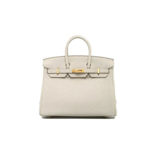 HERMES Birkin Bag in Beton Glacier White togo leather with silver hardware, a luxury bag for women symbolizing timeless style.